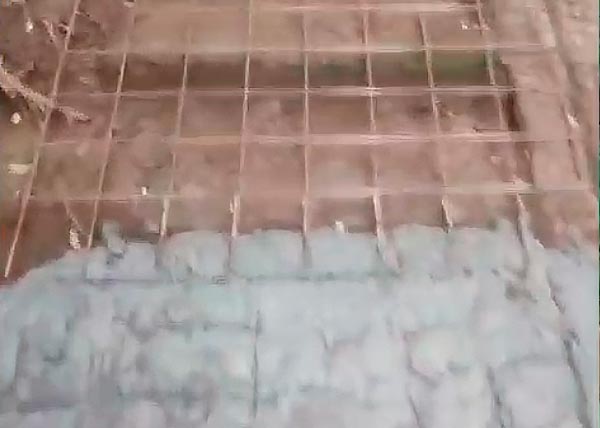 Obras da calçada de pedestres no acesso a rampa