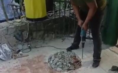 Construção do novo sistema de esgoto e  reforma do banheiro masculino.