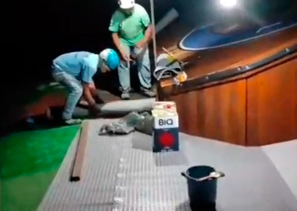 Colocação de piso emborrachado na rampa de parapente