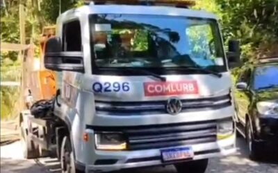 Recolhimento do lixo dos containers da área de estacionamento da rampa