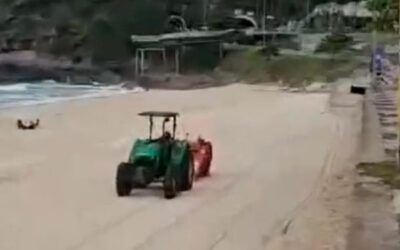 Nivelamento da areia da área de pouso da praia